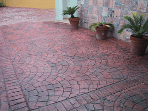 Stamped Concrete Patio - Old Brick Soldier Course and European Fan