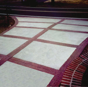New Brick Stacked Bond Stamped Concrete Driveway